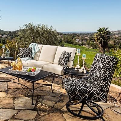 OW Lee patio set with white and back sunbrella replacement cushions
