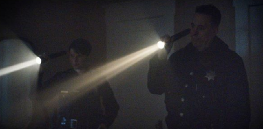 Male & female police officers on a call
