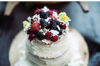 a gorgeous rustic cake topped with berries by tiffany friedman of butterroot