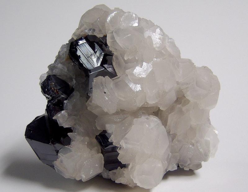 fluorescent CALCITE, SPHALERITE, PYRITE, Trepča Stan Terg Mine (Stari Trg Mine; Trepča Mine; Stan Trg Mine), Trepča complex, Trepča valley, Kosovska Mitrovica, District of Kosovska Mitrovica, Kosovo - for sale