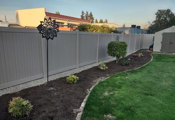 A great cedar wood fence built by All American Fence company and contractor