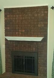 picture of brick fireplace before Carolina Custom Mounts installed flat screen tv and components, charlotte tv installers 