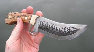 DIY Leaf spring knife with metal etched flames and a handle made from firewood. FREE step by step instructions. www.DIYeasycrafts.com