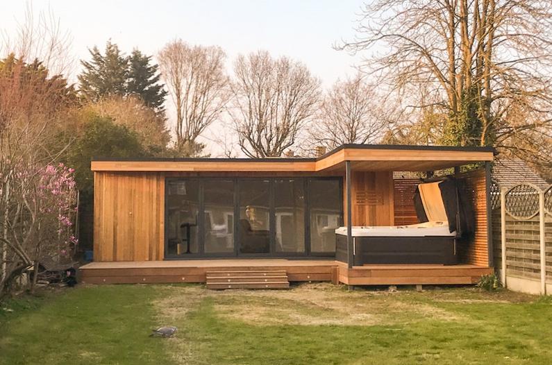 Large modern garden room with pool table and bar
