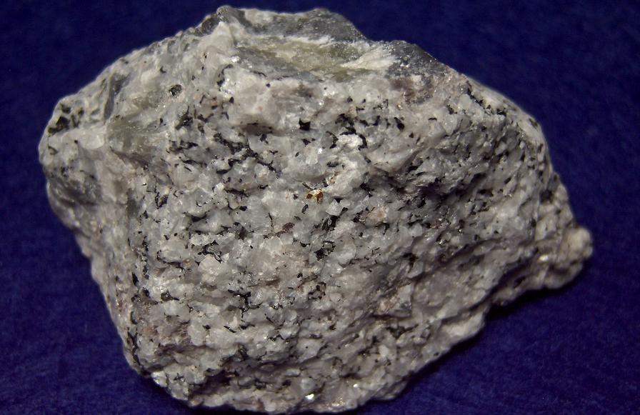 fluorescent SCAPOLITE, CORUNDUM SAPPHIRE, PLAGIOCLASE ALBITE ANORTHITE, BIOTITE -York River area, Dungannon Township, Hastings County, Ontario, Canada