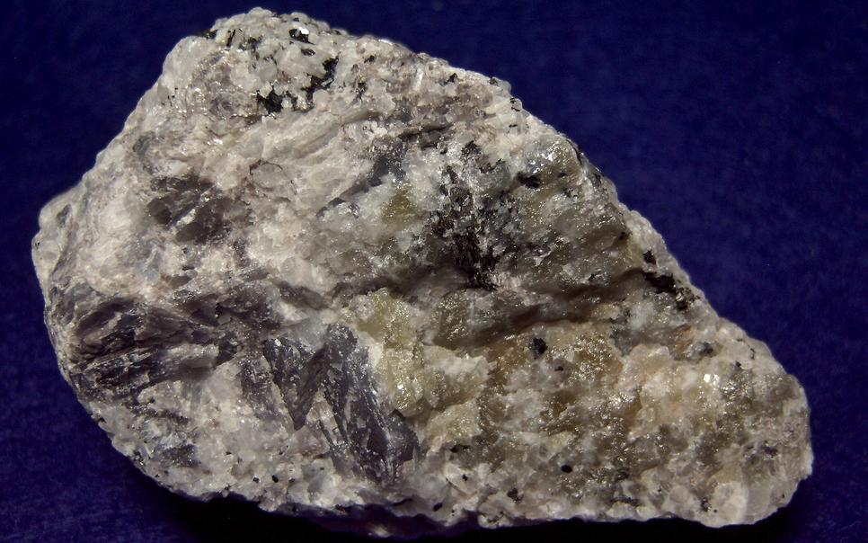 fluorescent SCAPOLITE, CORUNDUM SAPPHIRE, PLAGIOCLASE ALBITE ANORTHITE, BIOTITE -York River area, Dungannon Township, Hastings County, Ontario, Canada