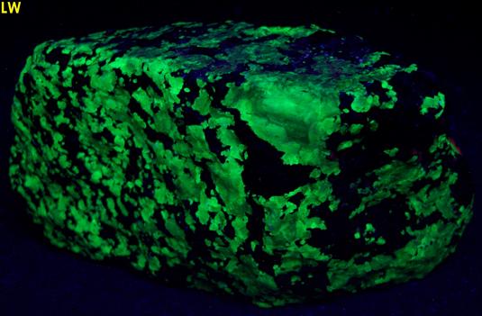 fluorescent CALCITE, phosphorescent WILLEMITE with FRANKLINITE, Sterling Mine, Sterling Hill, Ogdensburg, Franklin Mining District, Sussex County, New Jersey, USA, type locality