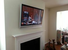 Carolina Custom Mounts, Flat Screen TV mounted over fireplace, Charlottes best tv mounting services