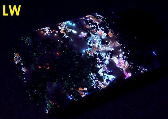 fluorescent phosphorescing Sphalerite Cleiophane, Willemite, Zincite, Franklinite, Magnetite, Calcite - Franklin, Franklin Mining District, Sussex County, New Jersey, USA