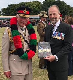 Prince Charles with Craig Lawrence at the Regimental Launch of the new Gurkha RGR25 book
