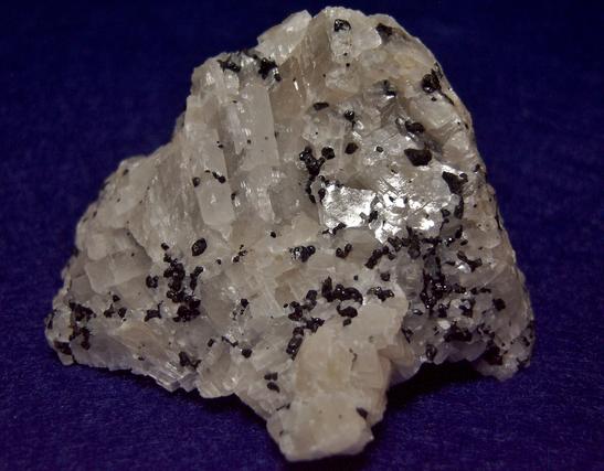 fluorescent WOLLASTONITE, BARYTE, CALCITE, WILLEMITE, DIOPSIDE, ANRDADITE, Franklin Mine, Franklin, Franklin Mining District, Sussex County, New Jersey, USA