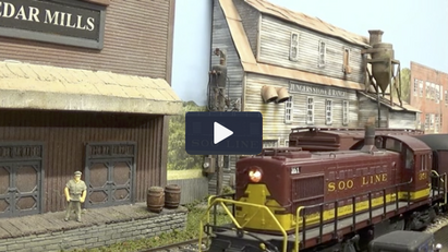 Image of train layout with link to Layout videos