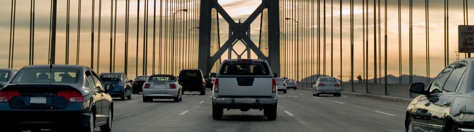 Cars driving over a bridge