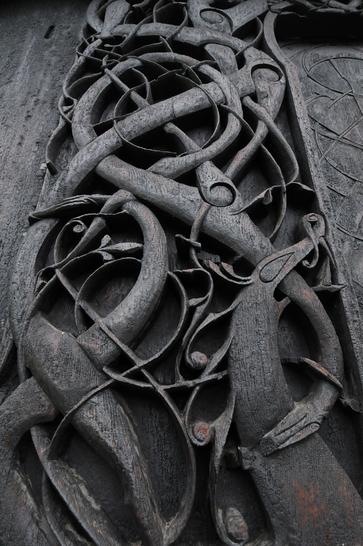 carved wood Hiberno-Urnes decorative panel at Urnes Stave Church. Photography Krevin O'Dwyer