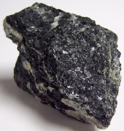 MAGNESIO-HORNBLENDE and fluorescent ALBITE, Philips Mine (Philips Pyrite Mine; Anthony's Nose Pyrrhotite Mine), Anthony's Nose, Philipstown Township, Putnam County, New York, USA