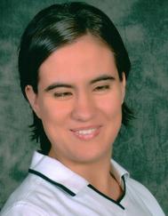 Portrait of Sara, smiling and looking at the camera