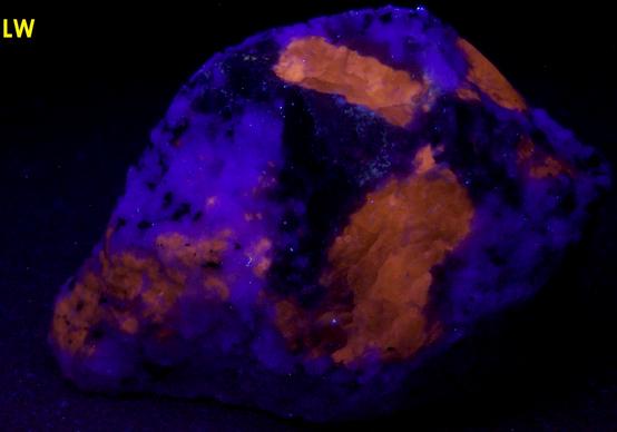 fluorescent SCAPOLITE, CORUNDUM SAPPHIRE, PLAGIOCLASE ALBITE ANORTHITE, BIOTITE -York River area, Dungannon Township, Hastings County, Ontario, Canada