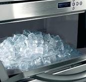 alt="ice machine and ice cubes"