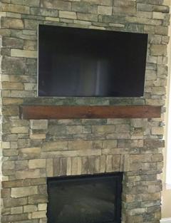 tv mounted to stone fireplace in charlotte nc, 