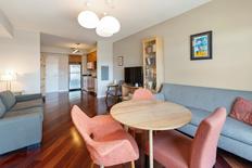 Living Room with Kitchen in background