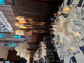 GOLDEN HORN CANDELABRA W/ FEATHERS