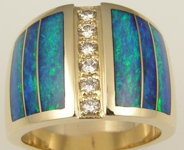 Wide opal inlay ring repaired to perfect condition by the inlay repair team at Hileman Inlay Jewelry.