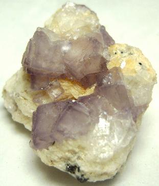 fluorescent FLUORITE on CALCITE with PYRITE, Huanzala Mine, Huallanca District, Bolognesi Province, Ancash Department, Peru