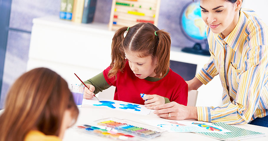 Students smiling in a group activity