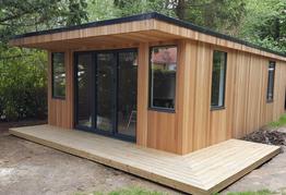 Modern cedar clad garden room with bar, LED lighting and sauna in Brentwood, Essex built by Robertson Garden Rooms