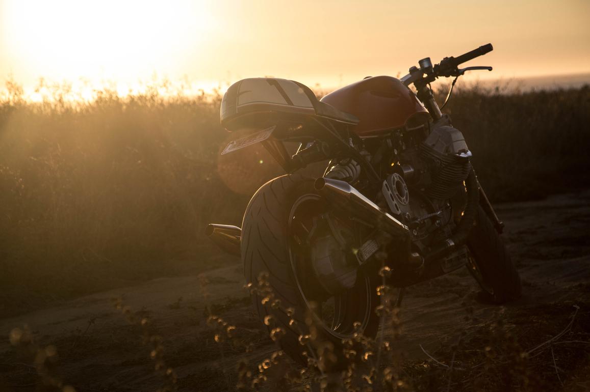 vintage cafe racer motorcycle sunset