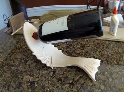 DIY easy Bent Wood Fish Shaped Wine bottle stand. www.DIYeasycrafts.com