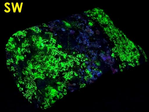 fluorescent phosphorescing Sphalerite Cleiophane, Willemite, Zincite, Franklinite, Magnetite, Calcite - Franklin, Franklin Mining District, Sussex County, New Jersey, USA