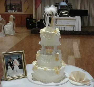 Anniversary Cake with Bride and Groom from original wedding reception