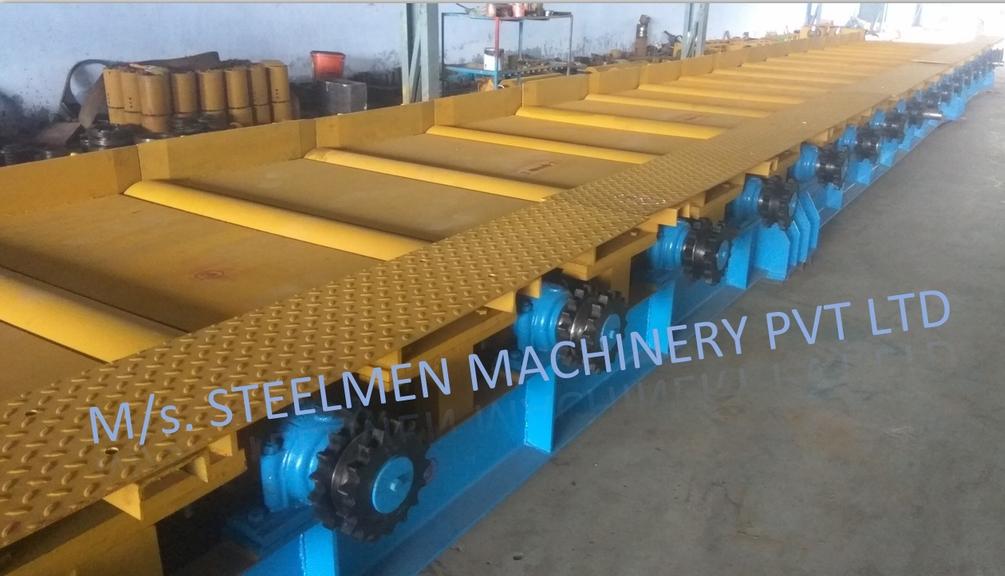 Y-TABLE FOR ROLLING MILLS, OIL LUBRICATION SYSTEM (Capacity - 50 LPM to 300 LPM), AUTOMATIC BUNDLING MACHINE, Hot Billet Shear, Billet Charging Grate, Flywheel, Gear Boxes, Mill Stands, Shearing Machines, Conveyor Rolls, Spindle Carrier, Pinch Rolls, Tilting Tables, Twin Channel, TMT Quenching System, Tail Breaker Pinch Rolls, Oil Lubrication System, Guide Box & Twist Pipes Mechanical Pusher, Mill Accessories, TMT Chain Transfer System, Recuperators, Cooling Tower, gear coupling, universal spindles, steel rolling mill, rolling mill items, steel plant machineries, steel plants, CCM, Continuous casting machine, steel melting, steel makers, leju Thomas, 9310524787, Gear boxes, Pinion stands, Rolling mill Stands on Fiber& bearings, Roller tables, Tilting tables, Y tables, Guide boxes, Chocks, Couplings, Spindles, Rotary shears, Flying shears, Cantilever type pinch Rolls, Tail Breaker pinch Rolls, Quenching Systems (for 8-16 mm, 16-25 mm, & 25-32 mm), Twin channel, Hot Rolling Mills, Shears, Automatic Cooling Bed, Quenching Boxes, Twin Channel Machine, Mill Stands, Cold Rolling Mills, Gear Couplings, Industrial Gear Box, Punching Cropping Machine, Hot Saw, Transmission Tower Machinery, Chain Transfer Systems, Product Design Development, Hot Rolling Mills Bar Rolling Mill Hot Rolling Mill Equipment Slit Rolling Mill Shears Flying Shear Crank Shear Continuous Rotating Shear Disc & Drum Shear Automatic Cooling Bed Quenching Boxes TMT Quenching Boxes Twin Channel Machine Industrial Gear Box Helical Gear Box Rolling Mill Gear Boxes Mill Stands Rolling Mill Stands TMT Mill Stands Housingless Mill Stands Cold Rolling Mills Gear Couplings Gear Jobwork Punching Cropping Machine Hot Saw Traveling type Hot Saw Fixed type Hot Saw Transmission Tower Machinery Chain Transfer Systems Product Design Development, Turnkey Solutions For Hot Rolling Mills Coilers Mill stands Shears & hot saws Twin channel Cooling beds Gear boxes & pinion stands TMT Equipment, Rolling Mill Machines Blade Grinding Machine Hot Saw Machines Straightening Machine Hydraulic Pusher, Hydraulic Cylinders, Ejectors, Hot Rolling Mill Flywheels Gear Boxes Mill Stands Gear Couplings Material Handling Equipment TMT Equipment Cooling Bed Shearing Machines Straightening Machines Spare Parts Of Rolling Mills Other Allied Equipments Bending & Time Machine Workshop Machinery, ♦ Bar Mills ♦ Structural Steel Mill Wire Rod Mill with Bar in Coil Line Rolling Mill for High-Grade Steels Section Mill High Speed Laying Head with Gear Box Crank Lever Shears Crank Shears Housingless Stands Double Crank Shears Rake Type Cooling Conventional Mill Stands Gear Boxes Rod mill block Varioblock Flying Shear • Tail Braking Pinch Roll • Cold Shear, Starting Stock Billets 160 x 160 x 12,000 mm 130 x 130 x 12,000 mm Furnace Group Charging grate, Hot charging, Elevator, Induction online heater Finished product Rebar 8 three-strand slit TMT Rebar 10 two-strand slit TMT Rebar 12-40 mm TMT Flats, angles and channels are possible too Sub-bundles 100-400 kg Master bundles 1 MT-3 MT Furnace Capacity 80 MT/h Main train Single-strand H/V arrangement, two strands are H/V type Roughing train : 4 off Model 600, 2 off Model 440, Free outlet after stand # 2 Intermediate train : 4 off Model 440, 4 off Model 340 Finishing train : 6 x Model 340 Associated shears Loopers : 8 off vertical, 6 off Single strand, 2 off multi strand Capacity 400,000 MT/y Cooling bed group Water quenching line, Thermex Cooling bed shear Cooling bed 66 x 10 m Finished speed 16 m/s (20 m/s) Material grades Carbon steels, Alloyed Structural Steel grades Continuous finishing shop Stationary cold shear 3,000 kN Counting system Small bundle forming 4 off Tying machine Various associated equipment, e.g. stoppers, chain transfers, roller tables, Starting stock Blooms 180 x 180 x 8,000 - 12,000 mm 300 x 300 x 8,000 - 12,000 mm Finished product Rebars 28 - 40 mm Rounds 30 - 100 mm dia. Hexagons 50 - 80 mm Flats 8 x 30 - 60 x 150 H-Beams 100 - 180 mm I-Beams 100 - 200 mm T-sections 75 - 140 mm Channels 100 - 200 mm Angles 80 x 80 x - 200 x 200 mm U-type sections for mine timbering 18U, 25U,29U Bundle/stack length 6 - 24 m Bundle/stack weight 2 - 5 t Furnace capacity 116/143 t/h Annual capacity 700,000 t/y Finishing speeds 6 m/s Material grades Carbon steels, Alloyed structural steel,Antifriction bearing steel Furnace group: Elevator (for hot charging), charging grate,weighscale, descaler, insulated holding tunnel Mill train: Single strand Roughing train 4 x Model 670, 1 x Model 760(V-H-HV-H) Intermediate train: 2 x Model 760, 4 x Model 670(H-H-H-UR-UR-HV) Finishing train: 5 x Model 670 (UR-HV-UR-HV-FUR) Associated shears Loopers: 4 x vertical Cooling bed group: Water cooling line, pinch roll unit Cooling bed shear Cooling bed 84 x 19 m Short-bar collecting device Continuous finishing shop In-line straightening machine (10 rollers) Hot saws: 1 x stationary, 1 x movable Abrasive cutting machines: 1 x fixed, 1 x movable Piling and stacking facilities (magnet-type) Tying machines: 2 x stationary, 2 x movable Various associated equipment, e.g. stoppers, chain transfers, roller tables. upto 150 x 150 x 12,000 mm Finished product: Wire rod 5.5 - 16 mm Rebars Nos. 3, 4 and 5 (as per ASTM) Coils 16 - 42 mm dia. Furnace capacity: 70 t/h Annual capacity: 300,000 t/y Finishing speeds: Wire rod line - 100 (120) m/s Bar in coil line - 13.5 m/s Material grades: Cold-heading steels Reinforcing steels Steels with a carbon content from low to medium Piano-wire PC-wire Free-cutting steel Water cooling line, pinch roll units, bar reels (2x), coil transfer,chain conveyor with retarded and accelerated cooling facilities, transfer unit to Power & Free coil handling system, Starting stock Billets 50 x 100 x 10,000 mm 125 x 125 x 11,400 mm Finished product Rod 5.5 - 13.5 mm dia. Bars 11 - 57 mm dia. Flads 22 - 120 mm, 5 - 12 mm thick Bundle/stack length 3 - 8.5 m Bundle/stack weight 0.5 - 3 (5) t Furnace capacity up to 60 t/h Material grades High-grade structural steels 34 Cr 4, 60 SiMn7, 42 CrMo4 Antifriction bearing steels 100 Cr 6, 100 Cr 2, 100 CrMo 7 3 Material grades Tool steels X 210 Cr 12, X 38 CrMoV 5 1, 55 CrNiMoVS 4 2 4 Acid-resistant and heat-resistant steels X 5 CrNiMo 18 11, X 2 CrNiMo 19 13,X 20 CrNiSi 25 4 High-speed steels X 79 Wco 18 5, X 82 W Mo 6 5 5 Special alloys X 55 CrMnNiN 20 8,X 45 CrSi 9 3 X 3 CrNiMoNbN 23 17 The complete range of steel grades includes approx. 300 different grades Furnace group: Charging grate, cross transfers, weighscale, descaler (2x), heatholding tunnel Mill train: Single strand, H/V - arrangement Roughing train: PSW and 6 x Model 440 Intermediate train: 4 x Model 440, 2 x Model 340 Finishing train: 4 x Model 340 Kocks-block 8-stand wire rod block for high grade steels 3 x 215/ 5 x 170 Associated shears Loopers: 7 x vertical, 1 x horizontal Cooling bed group: Water cooling line, pinch roll unit Cooling bed shear Cooling bed 57 x 5 m Continuous finishing shop: Abrasive cutting machine Piling and stacking facilities (non-magnet type) Tying machines: 1 x fi xed, 1 x movable various associated equipment, e.g. stoppers, chain transfers, roller tables etc. Rod finishing equipment: Water cooling and equalizing sections, pinch roll unit,laying head Ring conveyor for retarded and accelerated cooling reforming tub Pallet-type coil handling system, compacting & tying units,weighscale, unloading station Reel plant Water cooling and equalizing sections, Pinch roll units, Bar reels: 2 x, Transfer equipment to pallet-type coil handling system, Omsairam Steel & Alloys Pvt. Ltd., Bhagyalaxml Rolling Mills Pvt. Ltd., Kalika Re-rollers Pvt. Ltd., Parvati Alloys (P) Ltd., MITC Rolling Mills (P) Ltd., Maharashtra Steel Rolling & Engg Co. Chimanlal Vijay Kumar Steels Pvt. Ltd, Bhagwati Ferro Metals (P) Ltd, Balbir Rolling Mills Ltd. Quartz Metals Inds., Metro Alloys Ltd., Pushpak Steel Inds. Pvt Ltd., T. k. Ispat Pvt Ltd., Allied Ferromelt Pvt Ltd., Bhagwati Steel Cast Ltd., R. L. Steels Ltd., Guardian Steels Pvt. Ltd., Shri Karvir Nivasini Mahalakshmi Ispat Pvt. Ltd., Khatu Shyamji Steel Rolling Mills Pvt. Ltd., Kunal Ispat & Alloy Inds. Pvt Ltd. Sun Metallics & Alloys Pvt. Ltd, Hans Ispat Ltd. Shri Khatu Shyam Industries, Rajuri Steel Pvt. Ltd, Shree Om Steel Rolling, Air Carrying Corpn (I) Ltd., titan Alloys Ltd. Sunflag Iron & Steel Co. Ltd., Sharda Ispat Ltd., Fortune Metaliks Ltd., Sharda Shree Ispat Ltd., R. K. Structures Pvt. Ltd., Sanvijay Industries Pvt. Ltd., Shivali Udyog (I) Ltd., S.D. Bansal Iron & Steel Pvt. Ltd., Inertia Iron & Steel Inds. Pvt. Ltd., Nalwa Steel & Power Ltd., Shilpa Re-rollers Ltd., Sri Jai Balaj Steel Rolling Mills Ltd., Petropol India Ltd. Galwalia Ispat Udyog Pvt. Ltd. Crest Steel & Power Pvt. Ltd. Himalayan Rolling Steel Industries Pvt. Ltd., Shree Balaji Pigments Pvt. Ltd., Upper India Steel Mfg. & Engg. Co. Ltd., Capital Ispat Ltd., Barnala Steels Inds. Ltd., Shri S.S. Shyam Steels Pvt. Ltd. Fortune Metals Ltd. Rathi Udyog Ltd., M/s. Gallantt Ispat Lyd., Gemini Merchandise Pvt. Ltd., Jagdamba Rolling Mills, Shree Krishna Steel Rolling (Jaipur) Ltd. Modi Steels, Usha Martin Inds. Prince TMT Steels Pvt. Ltd., Dindigul Iron & Steel Co (P) Ltd. ARS Metals Ltd. V.V. Iron & Steel Company Pvt Ltd. Jairaj Ispat Ltd., Pioneer Torsteel Mills (P) Ltd., Devshree Ispat Pvt. Ltd., Vaibhav Merchantile Ltd., Maa Mahamaya Inds. Pvt. Ltd., Chitrakoot Metal Ltd. P. R. Rolling Mills Pvt. Ltd. Shree Aravindh Steels Ltd. Shyam Steel Industries Ltd. Shri Ramrupai Balaji Steels Ltd. Adhunik Ispat Pvt. Ltd. Durgapur Steels Ltd. B. M. A. Stainless Ltd. Zion Steel Ltd. Shree Metaliks Ltd. Usha Martin Ltd. Shyam Sel Ltd. Maithan Steel & Power Ltd.