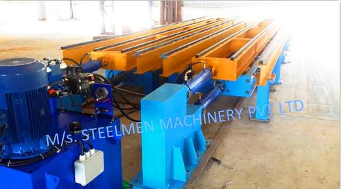 Y-TABLE FOR ROLLING MILLS, OIL LUBRICATION SYSTEM (Capacity - 50 LPM to 300 LPM), AUTOMATIC BUNDLING MACHINE, Hot Billet Shear, Billet Charging Grate, Flywheel, Gear Boxes, Mill Stands, Shearing Machines, Conveyor Rolls, Spindle Carrier, Pinch Rolls, Tilting Tables, Twin Channel, TMT Quenching System, Tail Breaker Pinch Rolls, Oil Lubrication System, Guide Box & Twist Pipes Mechanical Pusher, Mill Accessories, TMT Chain Transfer System, Recuperators, Cooling Tower, gear coupling, universal spindles, steel rolling mill, rolling mill items, steel plant machineries, steel plants, CCM, Continuous casting machine, steel melting, steel makers, leju Thomas, 9310524787, Gear boxes, Pinion stands, Rolling mill Stands on Fiber& bearings, Roller tables, Tilting tables, Y tables, Guide boxes, Chocks, Couplings, Spindles, Rotary shears, Flying shears, Cantilever type pinch Rolls, Tail Breaker pinch Rolls, Quenching Systems (for 8-16 mm, 16-25 mm, & 25-32 mm), Twin channel, Hot Rolling Mills, Shears, Automatic Cooling Bed, Quenching Boxes, Twin Channel Machine, Mill Stands, Cold Rolling Mills, Gear Couplings, Industrial Gear Box, Punching Cropping Machine, Hot Saw, Transmission Tower Machinery, Chain Transfer Systems, Product Design Development, Hot Rolling Mills Bar Rolling Mill Hot Rolling Mill Equipment Slit Rolling Mill Shears Flying Shear Crank Shear Continuous Rotating Shear Disc & Drum Shear Automatic Cooling Bed Quenching Boxes TMT Quenching Boxes Twin Channel Machine Industrial Gear Box Helical Gear Box Rolling Mill Gear Boxes Mill Stands Rolling Mill Stands TMT Mill Stands Housingless Mill Stands Cold Rolling Mills Gear Couplings Gear Jobwork Punching Cropping Machine Hot Saw Traveling type Hot Saw Fixed type Hot Saw Transmission Tower Machinery Chain Transfer Systems Product Design Development, Turnkey Solutions For Hot Rolling Mills Coilers Mill stands Shears & hot saws Twin channel Cooling beds Gear boxes & pinion stands TMT Equipment, Rolling Mill Machines Blade Grinding Machine Hot Saw Machines Straightening Machine Hydraulic Pusher, Hydraulic Cylinders, Ejectors, Hot Rolling Mill Flywheels Gear Boxes Mill Stands Gear Couplings Material Handling Equipment TMT Equipment Cooling Bed Shearing Machines Straightening Machines Spare Parts Of Rolling Mills Other Allied Equipments Bending & Time Machine Workshop Machinery, ♦ Bar Mills ♦ Structural Steel Mill Wire Rod Mill with Bar in Coil Line Rolling Mill for High-Grade Steels Section Mill High Speed Laying Head with Gear Box Crank Lever Shears Crank Shears Housingless Stands Double Crank Shears Rake Type Cooling Conventional Mill Stands Gear Boxes Rod mill block Varioblock Flying Shear • Tail Braking Pinch Roll • Cold Shear, Starting Stock Billets 160 x 160 x 12,000 mm 130 x 130 x 12,000 mm Furnace Group Charging grate, Hot charging, Elevator, Induction online heater Finished product Rebar 8 three-strand slit TMT Rebar 10 two-strand slit TMT Rebar 12-40 mm TMT Flats, angles and channels are possible too Sub-bundles 100-400 kg Master bundles 1 MT-3 MT Furnace Capacity 80 MT/h Main train Single-strand H/V arrangement, two strands are H/V type Roughing train : 4 off Model 600, 2 off Model 440, Free outlet after stand # 2 Intermediate train : 4 off Model 440, 4 off Model 340 Finishing train : 6 x Model 340 Associated shears Loopers : 8 off vertical, 6 off Single strand, 2 off multi strand Capacity 400,000 MT/y Cooling bed group Water quenching line, Thermex Cooling bed shear Cooling bed 66 x 10 m Finished speed 16 m/s (20 m/s) Material grades Carbon steels, Alloyed Structural Steel grades Continuous finishing shop Stationary cold shear 3,000 kN Counting system Small bundle forming 4 off Tying machine Various associated equipment, e.g. stoppers, chain transfers, roller tables, Starting stock Blooms 180 x 180 x 8,000 - 12,000 mm 300 x 300 x 8,000 - 12,000 mm Finished product Rebars 28 - 40 mm Rounds 30 - 100 mm dia. Hexagons 50 - 80 mm Flats 8 x 30 - 60 x 150 H-Beams 100 - 180 mm I-Beams 100 - 200 mm T-sections 75 - 140 mm Channels 100 - 200 mm Angles 80 x 80 x - 200 x 200 mm U-type sections for mine timbering 18U, 25U,29U Bundle/stack length 6 - 24 m Bundle/stack weight 2 - 5 t Furnace capacity 116/143 t/h Annual capacity 700,000 t/y Finishing speeds 6 m/s Material grades Carbon steels, Alloyed structural steel,Antifriction bearing steel Furnace group: Elevator (for hot charging), charging grate,weighscale, descaler, insulated holding tunnel Mill train: Single strand Roughing train 4 x Model 670, 1 x Model 760(V-H-HV-H) Intermediate train: 2 x Model 760, 4 x Model 670(H-H-H-UR-UR-HV) Finishing train: 5 x Model 670 (UR-HV-UR-HV-FUR) Associated shears Loopers: 4 x vertical Cooling bed group: Water cooling line, pinch roll unit Cooling bed shear Cooling bed 84 x 19 m Short-bar collecting device Continuous finishing shop In-line straightening machine (10 rollers) Hot saws: 1 x stationary, 1 x movable Abrasive cutting machines: 1 x fixed, 1 x movable Piling and stacking facilities (magnet-type) Tying machines: 2 x stationary, 2 x movable Various associated equipment, e.g. stoppers, chain transfers, roller tables. upto 150 x 150 x 12,000 mm Finished product: Wire rod 5.5 - 16 mm Rebars Nos. 3, 4 and 5 (as per ASTM) Coils 16 - 42 mm dia. Furnace capacity: 70 t/h Annual capacity: 300,000 t/y Finishing speeds: Wire rod line - 100 (120) m/s Bar in coil line - 13.5 m/s Material grades: Cold-heading steels Reinforcing steels Steels with a carbon content from low to medium Piano-wire PC-wire Free-cutting steel Water cooling line, pinch roll units, bar reels (2x), coil transfer,chain conveyor with retarded and accelerated cooling facilities, transfer unit to Power & Free coil handling system, Starting stock Billets 50 x 100 x 10,000 mm 125 x 125 x 11,400 mm Finished product Rod 5.5 - 13.5 mm dia. Bars 11 - 57 mm dia. Flads 22 - 120 mm, 5 - 12 mm thick Bundle/stack length 3 - 8.5 m Bundle/stack weight 0.5 - 3 (5) t Furnace capacity up to 60 t/h Material grades High-grade structural steels 34 Cr 4, 60 SiMn7, 42 CrMo4 Antifriction bearing steels 100 Cr 6, 100 Cr 2, 100 CrMo 7 3 Material grades Tool steels X 210 Cr 12, X 38 CrMoV 5 1, 55 CrNiMoVS 4 2 4 Acid-resistant and heat-resistant steels X 5 CrNiMo 18 11, X 2 CrNiMo 19 13,X 20 CrNiSi 25 4 High-speed steels X 79 Wco 18 5, X 82 W Mo 6 5 5 Special alloys X 55 CrMnNiN 20 8,X 45 CrSi 9 3 X 3 CrNiMoNbN 23 17 The complete range of steel grades includes approx. 300 different grades Furnace group: Charging grate, cross transfers, weighscale, descaler (2x), heatholding tunnel Mill train: Single strand, H/V - arrangement Roughing train: PSW and 6 x Model 440 Intermediate train: 4 x Model 440, 2 x Model 340 Finishing train: 4 x Model 340 Kocks-block 8-stand wire rod block for high grade steels 3 x 215/ 5 x 170 Associated shears Loopers: 7 x vertical, 1 x horizontal Cooling bed group: Water cooling line, pinch roll unit Cooling bed shear Cooling bed 57 x 5 m Continuous finishing shop: Abrasive cutting machine Piling and stacking facilities (non-magnet type) Tying machines: 1 x fi xed, 1 x movable various associated equipment, e.g. stoppers, chain transfers, roller tables etc. Rod finishing equipment: Water cooling and equalizing sections, pinch roll unit,laying head Ring conveyor for retarded and accelerated cooling reforming tub Pallet-type coil handling system, compacting & tying units,weighscale, unloading station Reel plant Water cooling and equalizing sections, Pinch roll units, Bar reels: 2 x, Transfer equipment to pallet-type coil handling system, Omsairam Steel & Alloys Pvt. Ltd., Bhagyalaxml Rolling Mills Pvt. Ltd., Kalika Re-rollers Pvt. Ltd., Parvati Alloys (P) Ltd., MITC Rolling Mills (P) Ltd., Maharashtra Steel Rolling & Engg Co. Chimanlal Vijay Kumar Steels Pvt. Ltd, Bhagwati Ferro Metals (P) Ltd, Balbir Rolling Mills Ltd. Quartz Metals Inds., Metro Alloys Ltd., Pushpak Steel Inds. Pvt Ltd., T. k. Ispat Pvt Ltd., Allied Ferromelt Pvt Ltd., Bhagwati Steel Cast Ltd., R. L. Steels Ltd., Guardian Steels Pvt. Ltd., Shri Karvir Nivasini Mahalakshmi Ispat Pvt. Ltd., Khatu Shyamji Steel Rolling Mills Pvt. Ltd., Kunal Ispat & Alloy Inds. Pvt Ltd. Sun Metallics & Alloys Pvt. Ltd, Hans Ispat Ltd. Shri Khatu Shyam Industries, Rajuri Steel Pvt. Ltd, Shree Om Steel Rolling, Air Carrying Corpn (I) Ltd., titan Alloys Ltd. Sunflag Iron & Steel Co. Ltd., Sharda Ispat Ltd., Fortune Metaliks Ltd., Sharda Shree Ispat Ltd., R. K. Structures Pvt. Ltd., Sanvijay Industries Pvt. Ltd., Shivali Udyog (I) Ltd., S.D. Bansal Iron & Steel Pvt. Ltd., Inertia Iron & Steel Inds. Pvt. Ltd., Nalwa Steel & Power Ltd., Shilpa Re-rollers Ltd., Sri Jai Balaj Steel Rolling Mills Ltd., Petropol India Ltd. Galwalia Ispat Udyog Pvt. Ltd. Crest Steel & Power Pvt. Ltd. Himalayan Rolling Steel Industries Pvt. Ltd., Shree Balaji Pigments Pvt. Ltd., Upper India Steel Mfg. & Engg. Co. Ltd., Capital Ispat Ltd., Barnala Steels Inds. Ltd., Shri S.S. Shyam Steels Pvt. Ltd. Fortune Metals Ltd. Rathi Udyog Ltd., M/s. Gallantt Ispat Lyd., Gemini Merchandise Pvt. Ltd., Jagdamba Rolling Mills, Shree Krishna Steel Rolling (Jaipur) Ltd. Modi Steels, Usha Martin Inds. Prince TMT Steels Pvt. Ltd., Dindigul Iron & Steel Co (P) Ltd. ARS Metals Ltd. V.V. Iron & Steel Company Pvt Ltd. Jairaj Ispat Ltd., Pioneer Torsteel Mills (P) Ltd., Devshree Ispat Pvt. Ltd., Vaibhav Merchantile Ltd., Maa Mahamaya Inds. Pvt. Ltd., Chitrakoot Metal Ltd. P. R. Rolling Mills Pvt. Ltd. Shree Aravindh Steels Ltd. Shyam Steel Industries Ltd. Shri Ramrupai Balaji Steels Ltd. Adhunik Ispat Pvt. Ltd. Durgapur Steels Ltd. B. M. A. Stainless Ltd. Zion Steel Ltd. Shree Metaliks Ltd. Usha Martin Ltd. Shyam Sel Ltd. Maithan Steel & Power Ltd.