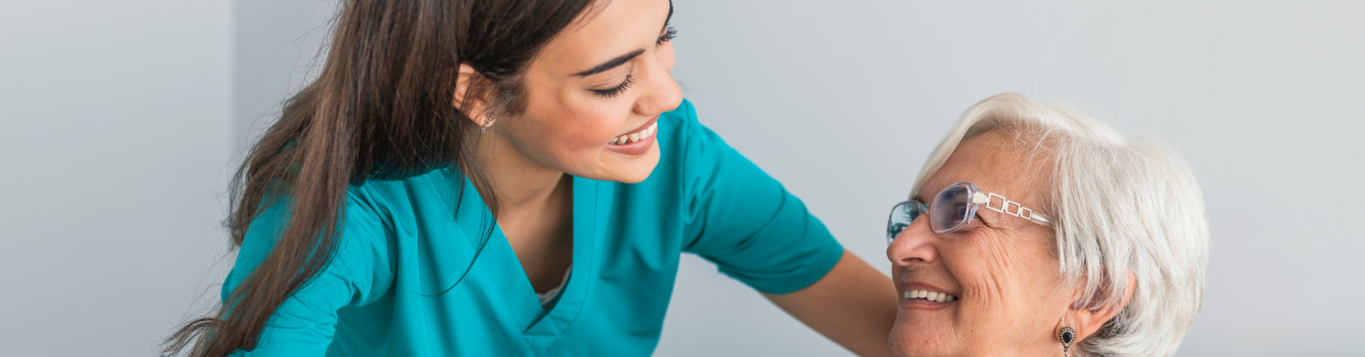 Nurse speaking to Featherstone Assisted Living member