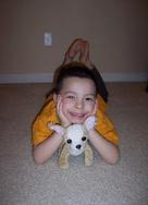 Anthony and puppy on clean carpet