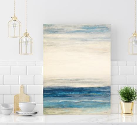 Blue Art ocean seascape in light blue and white which shows calm ocean water and clouds in the sky.