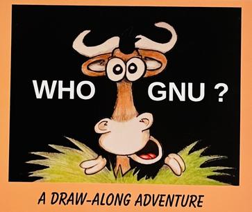 Who Gnu? A cow looks out from behind a bush