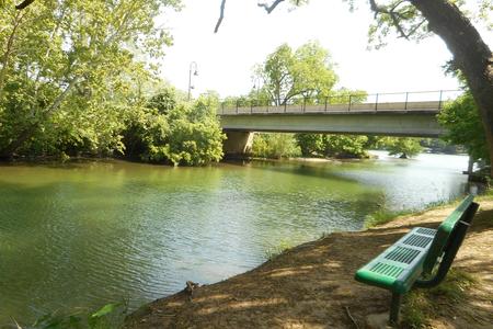 Photograph of park bench near Panther Hollow Creek