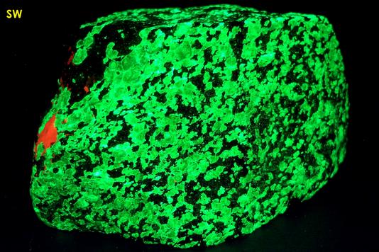 fluorescent CALCITE, phosphorescent WILLEMITE with FRANKLINITE, Sterling Mine, Sterling Hill, Ogdensburg, Franklin Mining District, Sussex County, New Jersey, USA, type locality