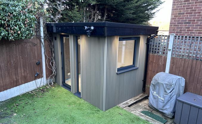 Large modern garden room with pool table and bar