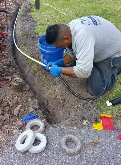 Waterfall Irrigation at work on pump repair.