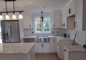 Painting kitchen cabinets.