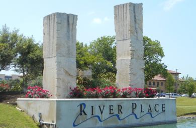 Picture of River Place Sign at the entrance of the community