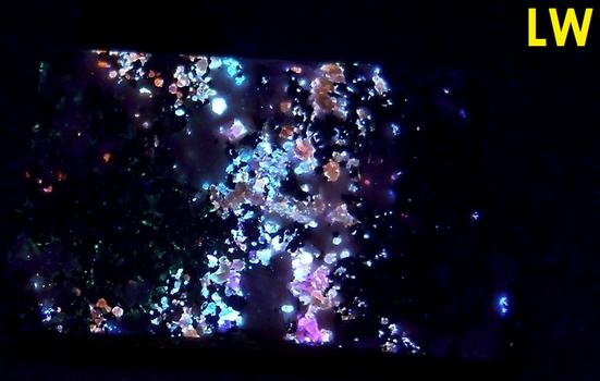 fluorescent phosphorescing Sphalerite Cleiophane, Willemite, Zincite, Franklinite, Magnetite, Calcite - Franklin, Franklin Mining District, Sussex County, New Jersey, USA