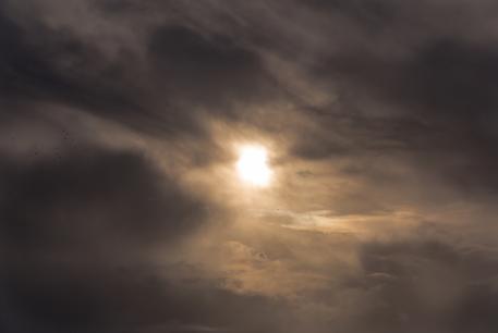sun over clouds wallpaper