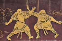 Historical image of Tai Chi practitioners practising push hands.