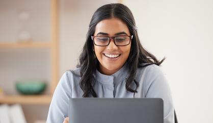 Image of a businesswoman at a corporate office