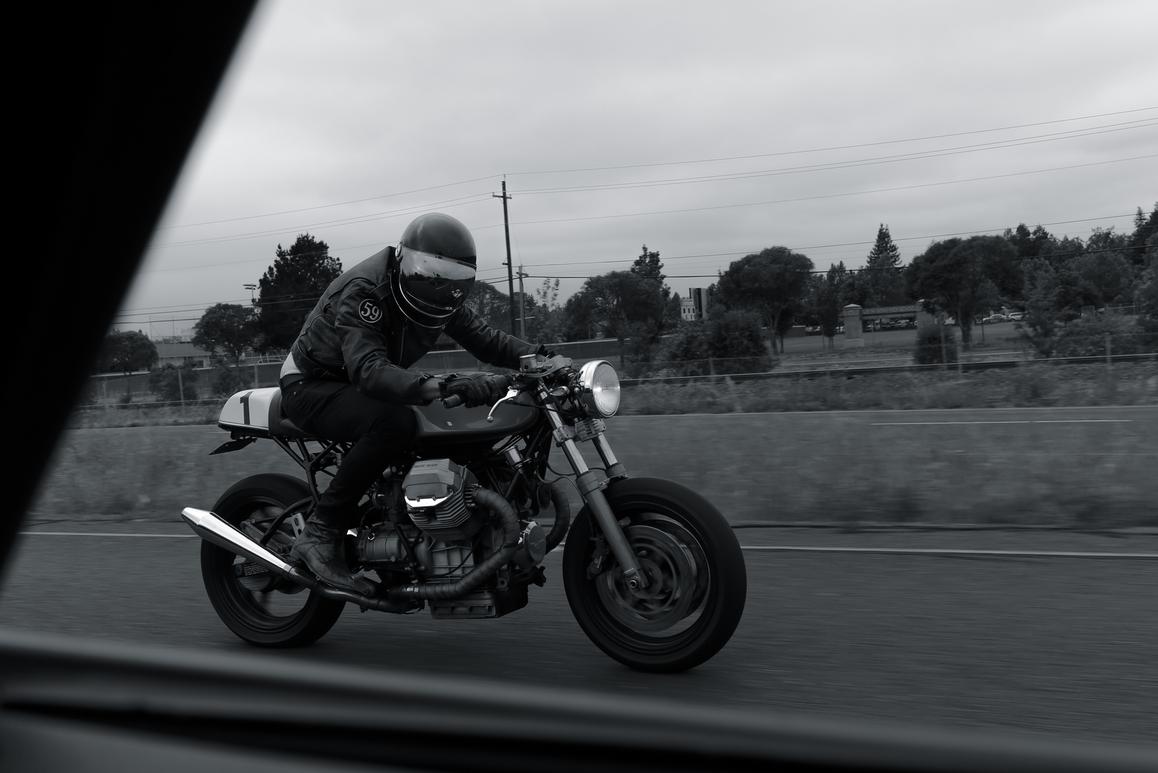 hot girl on cafe racer custom motorcycle